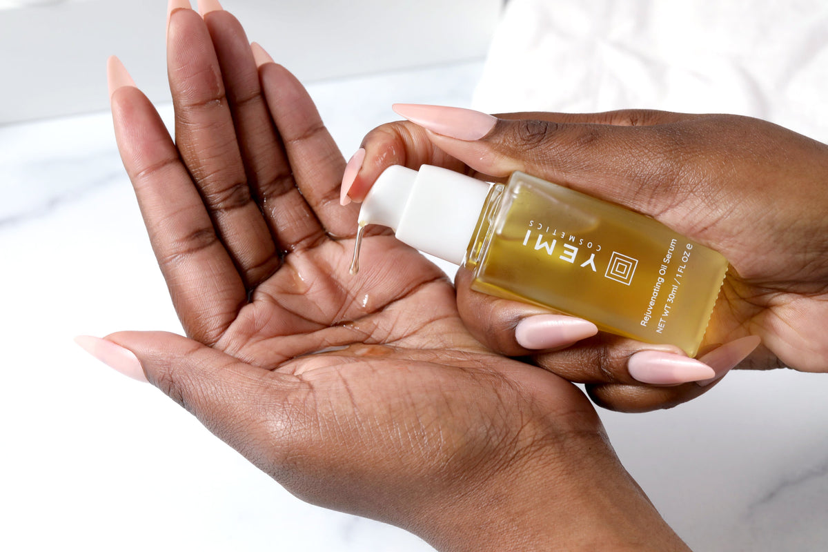Yemi Rejuvenating Oil Serum being pumped into a hand